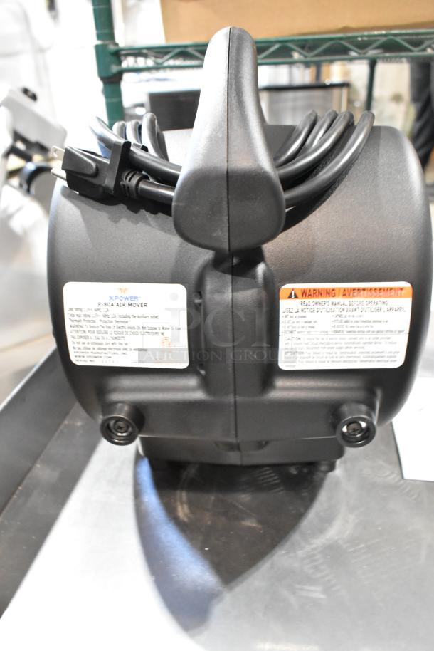 BRAND NEW Xpower P-80A Air Mover, black, with warning and product labels, power cord wrapped, ready for use.