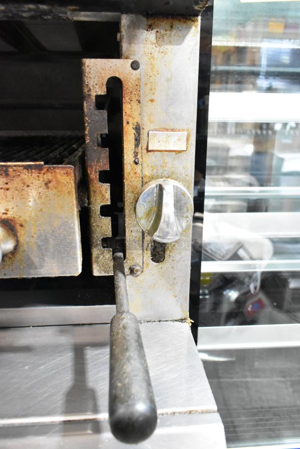 Vulcan VIR1CF stainless steel broiler detail; shows control knob and handle with visible wear, commercial-grade.