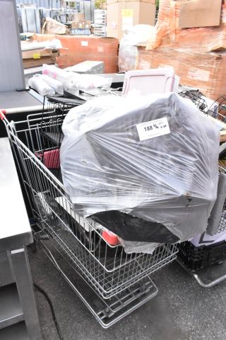 Shopping cart with contents including metal baking pans, cup dispenser, and topping bin, wrapped in plastic, tagged "188 9/16 qty v-lot".