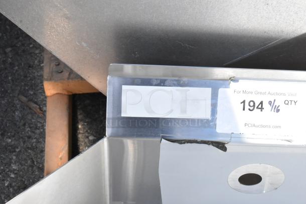 Stainless steel dishwasher table, right side dirty side, brand new with minor scratches and dents; labeled "194 9/16" by PCI Auctions.