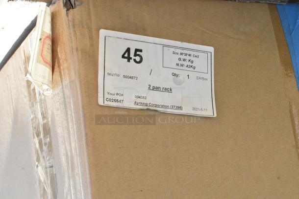 13 boxes labeled with "2 pan rack," new condition, item no. 5004872, by Ayrking Corporation.