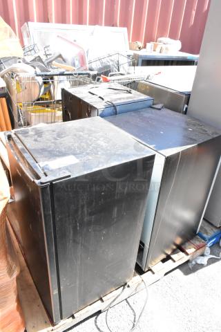 Four mini coolers, featuring Galanz GLR33MBKE23, Haier HC46SF10SV, Frigidaire EFMIS9000, all 115 volts, stored on a pallet.