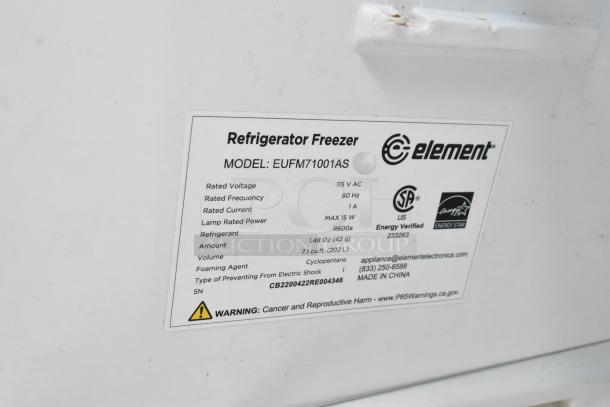Label on Element Model EUFM71001AS freezer showing specs: 115V, 60Hz, 1A, R600a refrigerant, 7.1 cu.ft. Capacity. Energy Star certified.