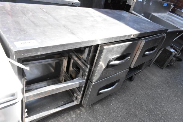 Norlake UR72 stainless steel undercounter cooler, 6 drawers, commercial casters, 115 volts, 1 phase, visible wear.