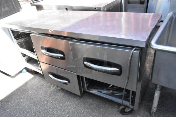 Norlake UR72 stainless steel undercounter cooler with 6 drawers and commercial casters, 115V, 1 Phase, used condition.