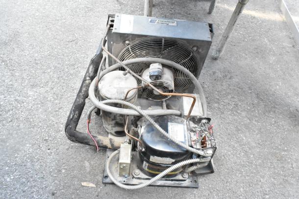 Copeland REK3-0125-PFV-959 compressor, 208/230V, 1 phase, used condition, visible wiring and components, Copeland label.