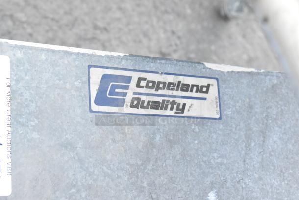 Copeland REK3-0125-PFV-959 Compressor label. Features 208/230V, 1 Phase, Copeland Quality branding.