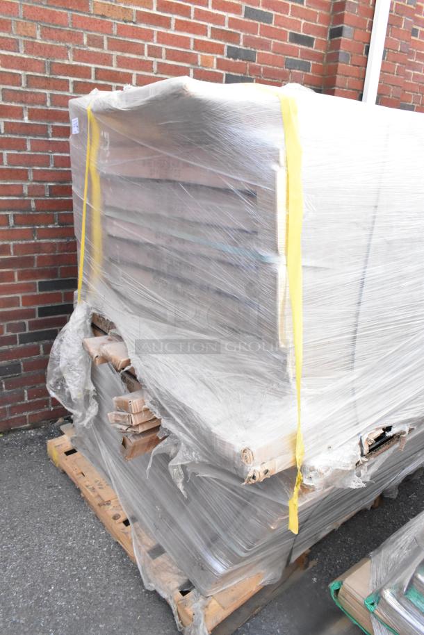 Wrapped pallet containing 42 new boxes of Quantum 3072BK black wire shelves. Boxes secured for auction sale.