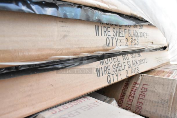 42 boxes of Quantum 3072BK black wire shelves, each containing two pieces. Brand new and stacked for auction.