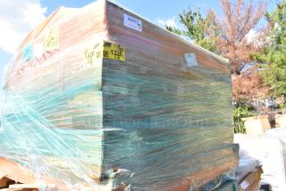 Shrink-wrapped pallet of 12 brand new boxes including Metro 2448BR shelves. Yellow and white labels visible.