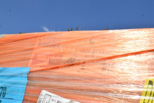 Twelve brand new Metro 2448BR shelf boxes wrapped in orange plastic, labels indicating model and shipment details.