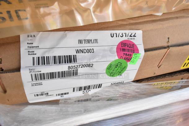 18 brand new boxes, including H&K WND003 IMI Template, showing labels with model and serial numbers. Mint condition.