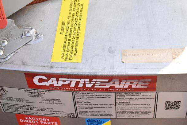 2021 CaptiveAire CASRE13BD metal commercial power ventilator with safety labels and CaptiveAire branding visible.