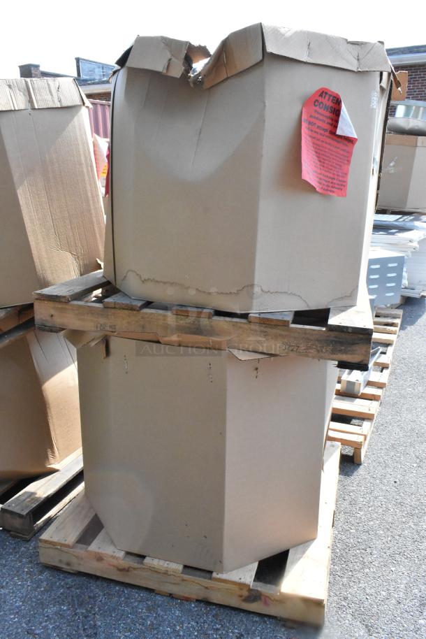 Two brand new CaptiveAire EADMUA14-F metal rooftop exhaust mushroom fans in original boxes, minor box wear shown.