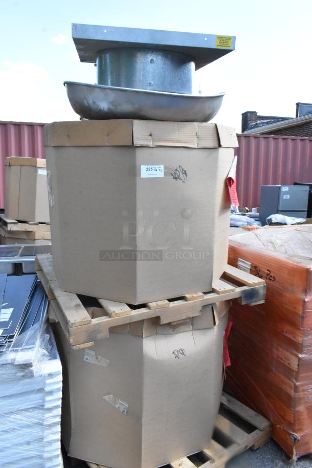 Brand new CaptiveAire DMUA18FA metal rooftop exhaust mushroom fans, in box, with one unboxed on pallet.