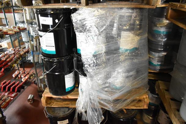 24 Pro Guard Chemicals, including 5-gallon Liquid Rubber. Black containers with product labels, pallet wrapped. Auction lot.