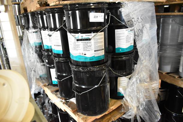 24 Pro Guard chemical buckets, including 5-gallon white liquid rubber. Black containers with labels on pallets.