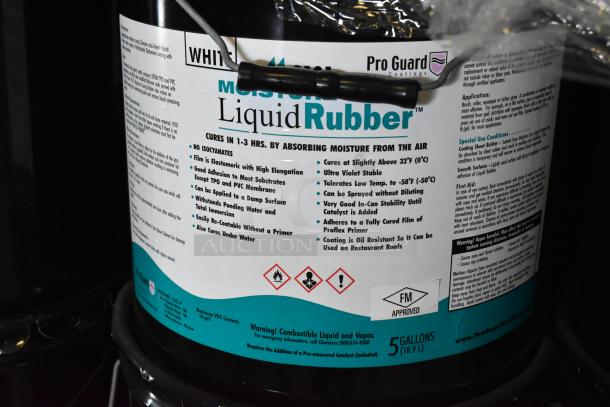 5-gallon Pro Guard white liquid rubber, moisture-curing, elastomeric, suitable for damp surfaces, labeled with safety warnings.