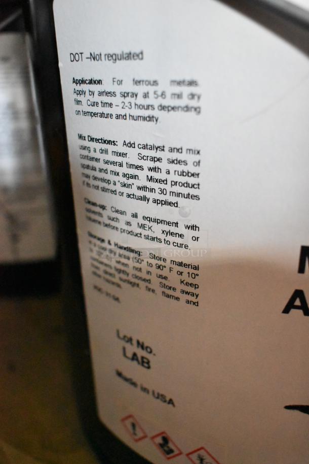 Alt Text: Label on Pro Guard chemical container detailing application, mix directions, clean-up, and storage instructions. Made in USA.