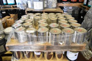 35 Pro Guard chemical cans, including EPDM 9908 Super Pipe Seal Part A, 1-gallon size, wrapped on a pallet.