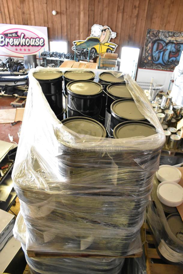 A large stack of Pro Guard chemical containers, including 4-gallon 9611 MC Poly Restoration Coating, wrapped in plastic on pallets.