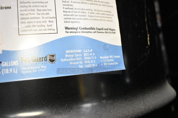 Container of Pro Guard liquid rubber gray EPDM, 55 gallons, ingredients listed, used for industrial sealing and roofing.