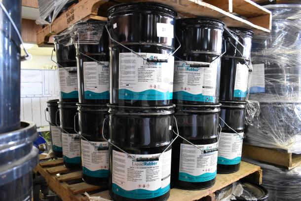 23 Pro Guard chemical containers, including 5-gallon 9101 Moisture Cure Liquid Rubber, stacked on pallets.