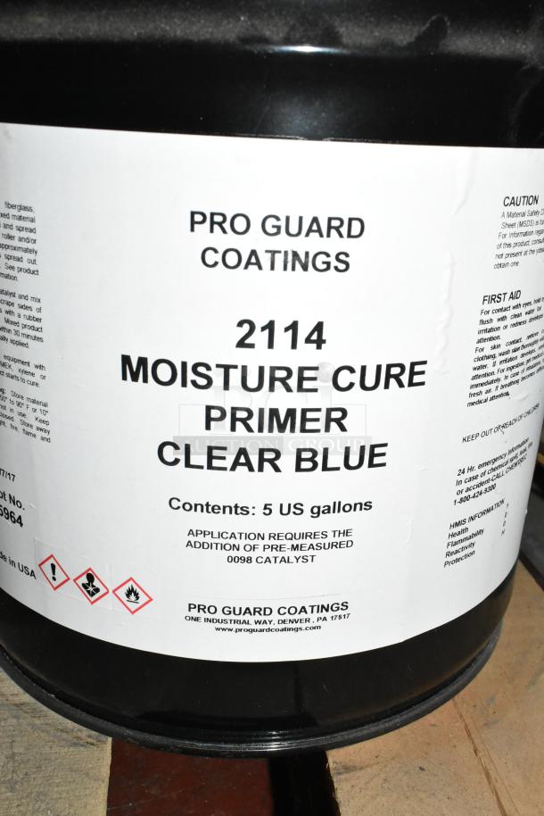 Container of Pro Guard Coatings 2114 Moisture Cure Primer Clear Blue. Includes 5 gallons, caution symbols, and application details.