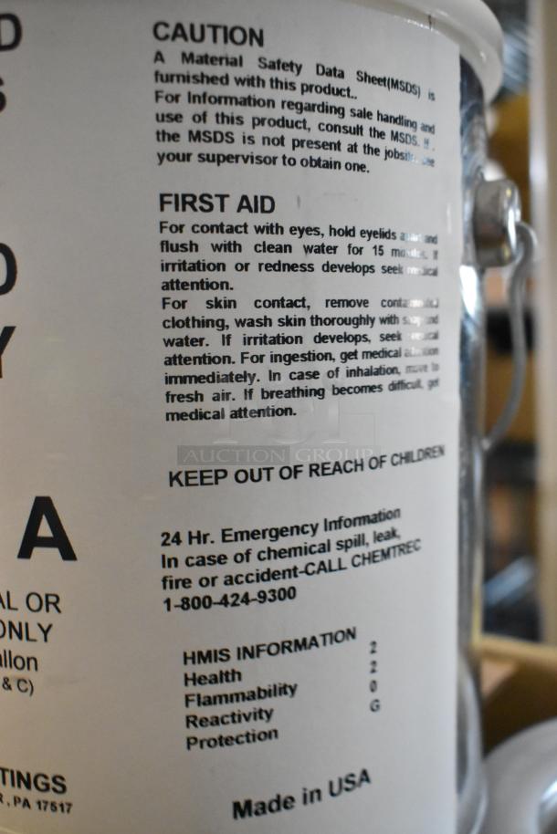 Nine Pro Guard Chemicals including 2407 Part A Epoxy. Label shows safety instructions and Made in USA marking. Appears in good condition.