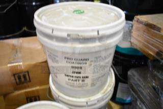 Seven Pro Guard chemical containers, including 2-gallon 9908 EPDM Super Pipe Seal Part B. Labels detail usage instructions.