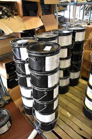 Stacked black Pro Guard chemical cans, including 2-gallon 9611 MC Poly Restoration Coating Part B, on wooden pallet.