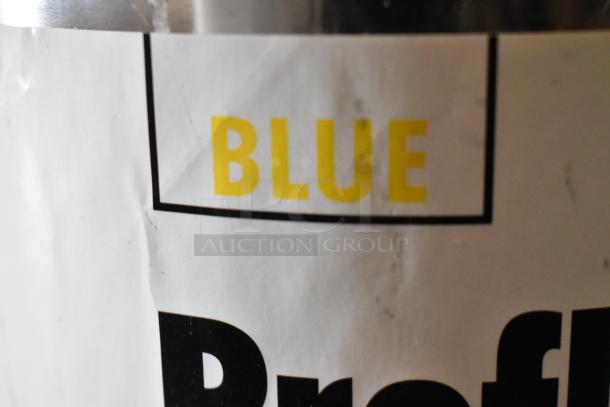 Label on Pro Guard chemical container showing the word "BLUE" in bold yellow text on a white background.