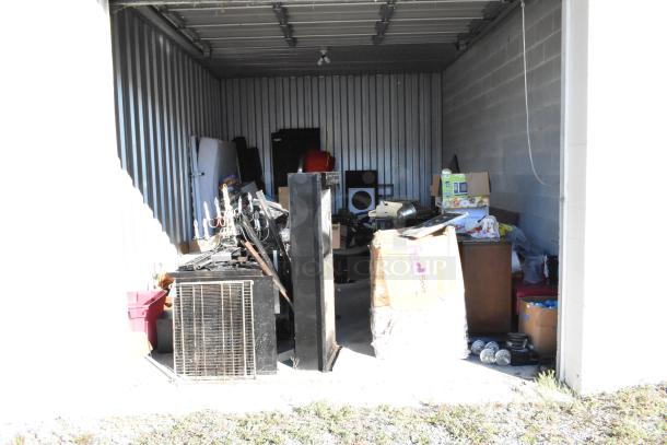 Contents of Storage Unit #60, including a portable grill, trash can, weight plates, games, Bunn coffee machines, and chairs.