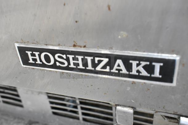 2019 Hoshizaki HR15A stainless steel ice machine, visible brand label, some surface wear, 115V, 1 phase.