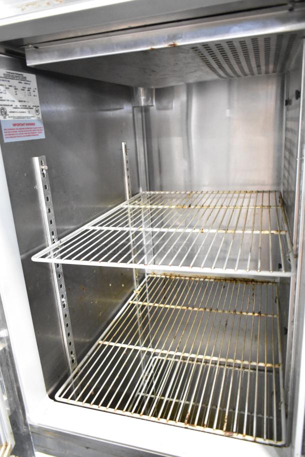 Continental 1R-SS-PT-HD stainless steel commercial cooler interior with racks, commercial casters, 115V, 1 phase.