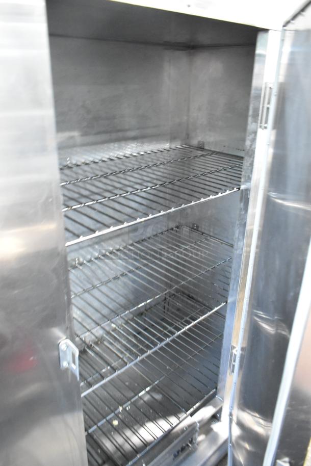CresCor EB150 stainless steel heated holding cabinet with commercial casters, shelves visible, 120V, 1 Phase, good condition.