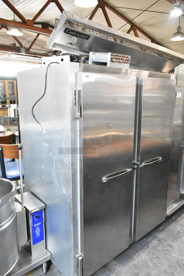 Continental 2R stainless steel commercial 2-door reach-in cooler, features commercial casters, 115V, 1 phase, in good condition.