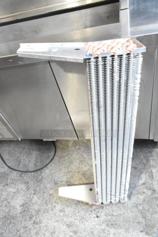 XCCC 6R7K844L Evaporator Coil in excellent condition, showing metal fins and copper coil connections.