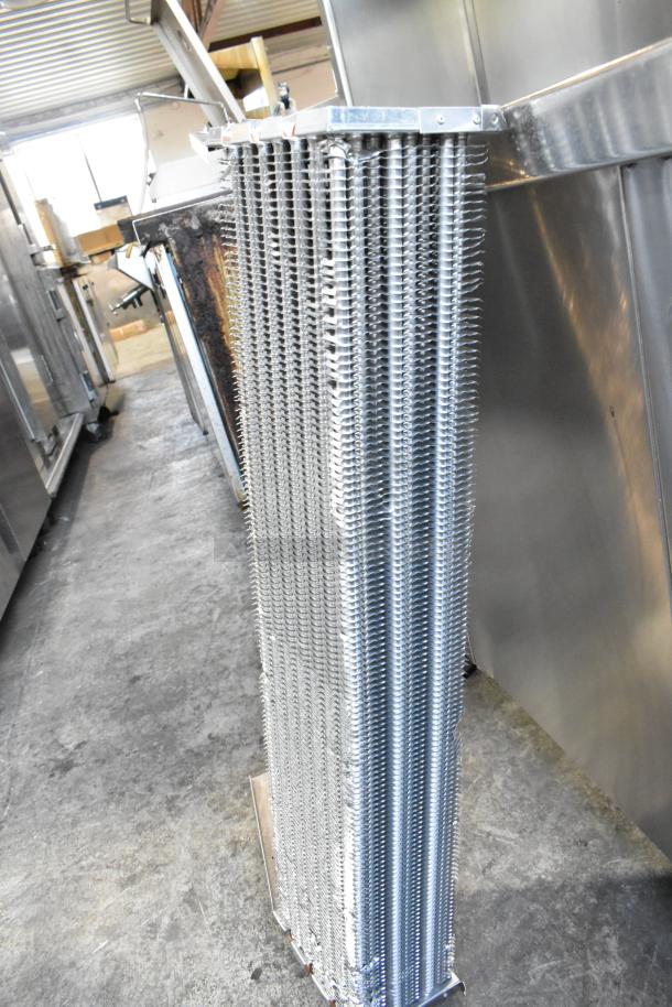 XCCC 6R7K844L Evaporator Coil in excellent condition. Features durable metal fins and brackets, ideal for refrigeration systems.