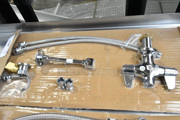 Brand new scratch and dent spray nozzle attachment, chrome finish, includes hoses and fittings, visible model label "12".