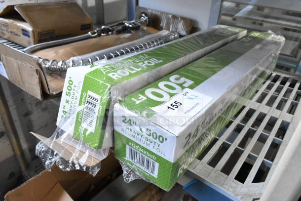 2 new 12224X5HD 24"x500' heavy-duty aluminum foil rolls, slight dents, original packaging, auction tag visible.