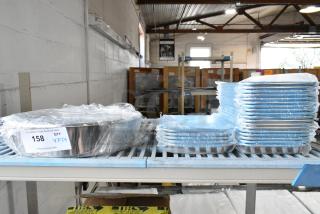 24 metal baking pans, brand new with minor scratches, wrapped in plastic. Includes bidder tag with quantity note.