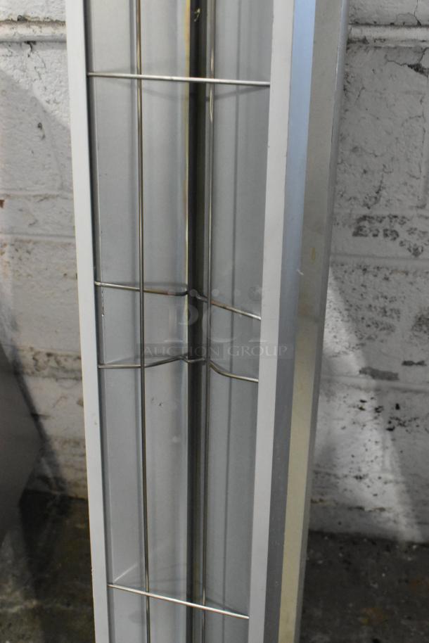 2 Winco ESH-60 metal heat strip warmers, 120 volts, 1 phase, unblemished condition, industrial grade.