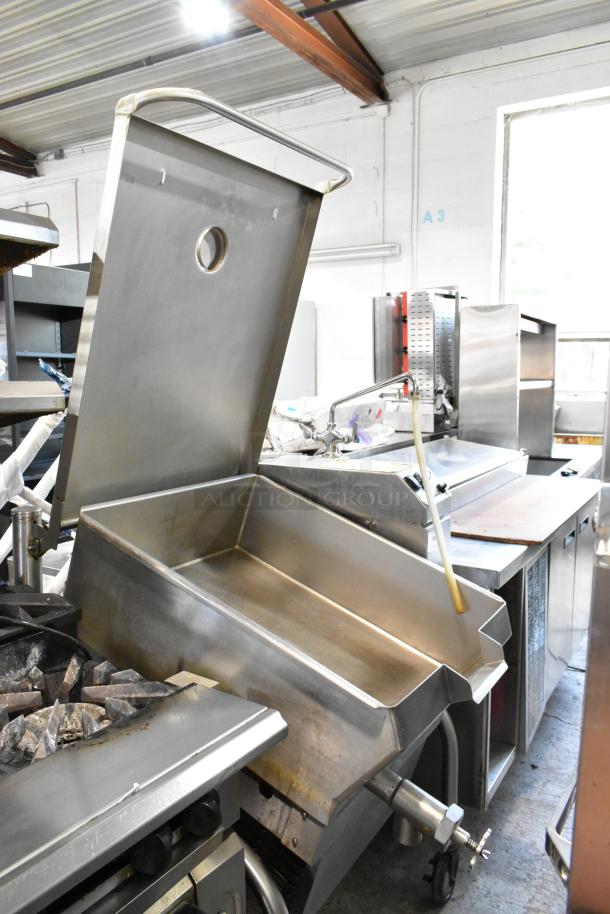 Cleveland stainless steel tilting braising pan, commercial floor style, on casters, excellent condition.