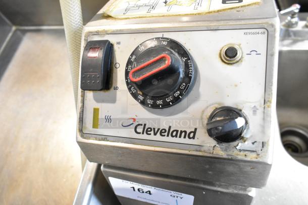 Cleveland stainless steel tilting braising pan on casters. Features control panel with temperature dial and markings.