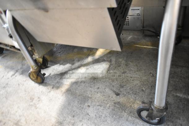 Cleveland stainless steel commercial tilting braising pan on casters, showing sturdy construction, ideal for commercial use.