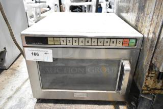 Panasonic stainless steel commercial countertop microwave oven, keypad controls, visible wear, auction tag marked #166.
