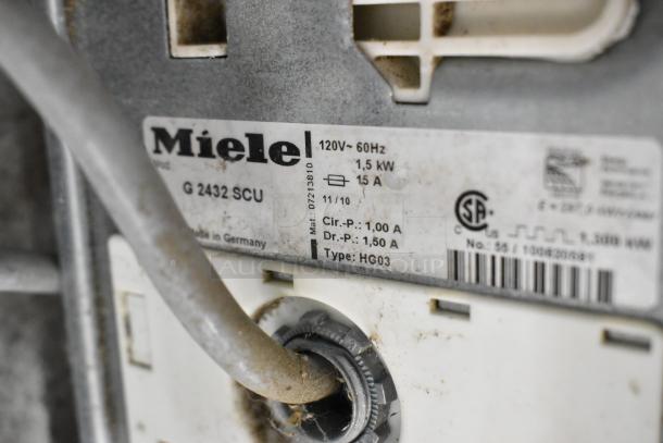 Miele G2432SCU stainless steel undercounter dishwasher label, 115V, 1 Phase, with specifications and model details visible.