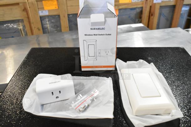 Suraielec Wireless Wall Switch Outlet, brand new in box, with outlet, switch, and mounting hardware visible.