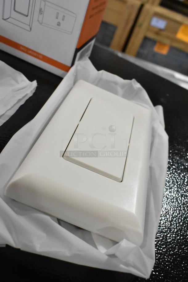 Brand new Suraielec wireless wall switch outlet, sealed in packaging. Features wireless control, pristine condition.